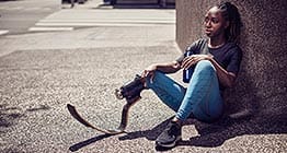 woman sitting on ground